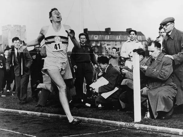 Roger Bannister breaking the four-minute mile in 1954, illustrating how a new story changes what's possible